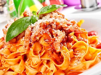 Fettuccine pasta tossed in fresh tomato sauce with pork cheek.