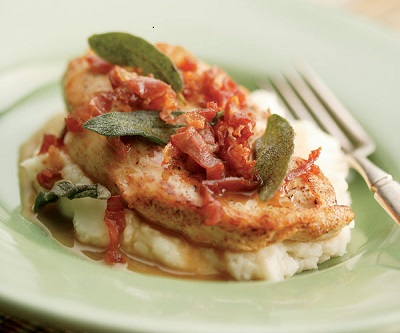 Perfectly cooked veal in a tasty sauce wrapped in prosciutto.