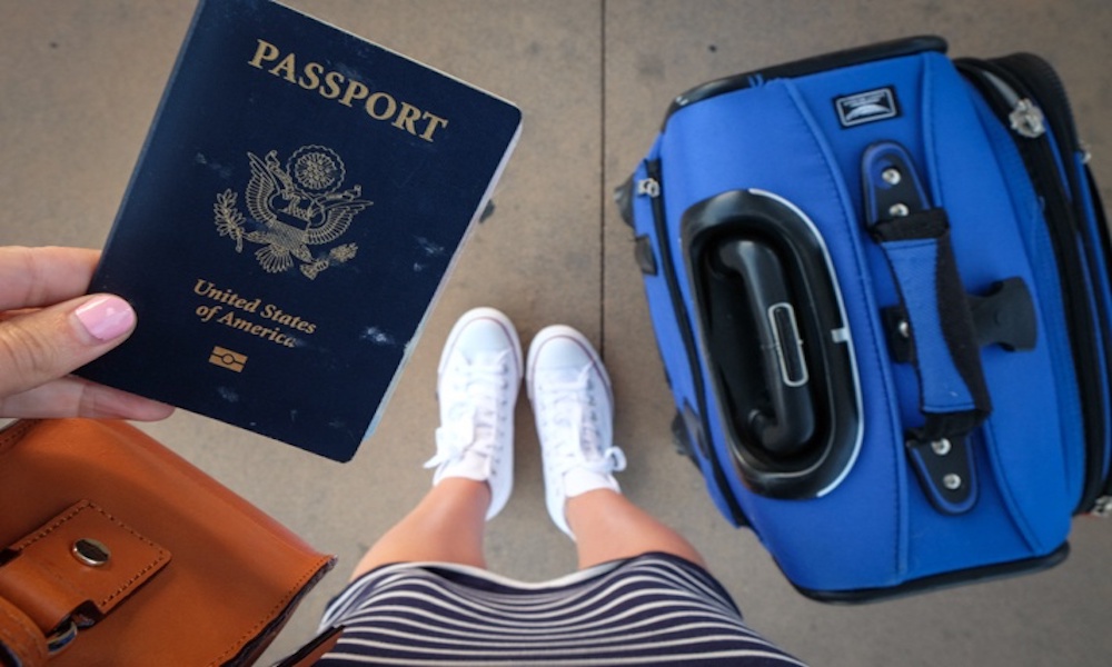 picture of a female holding her passport