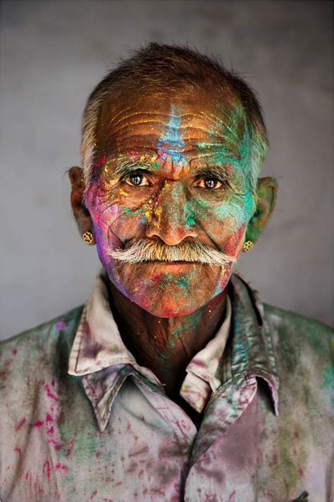 portrait of an old man with paint on his face