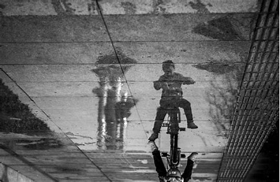 reflection of child biking
