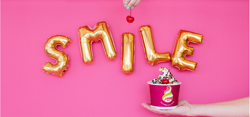 yellow smile letters in ballons with pink background